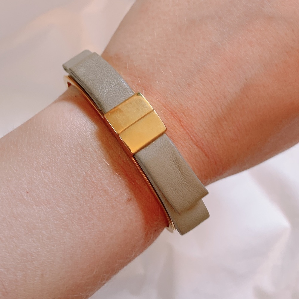 Gray leather bow gold bracelet Vince camuto